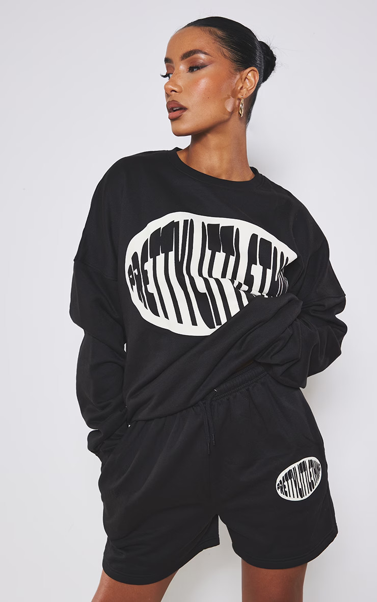 PRETTYLITTLETHING Black Oversized Printed Sweater | Pretty Little Thing (Australia & New Zealand)
