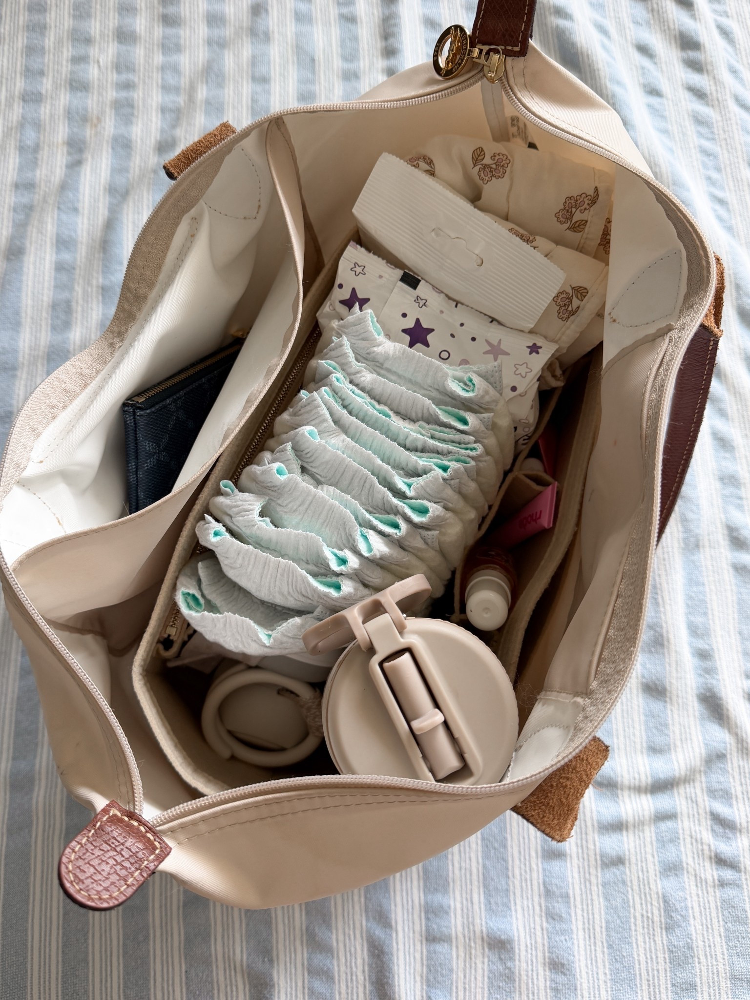 Longchamp diaper bag - I have the size large and the organizer with it is perfection 