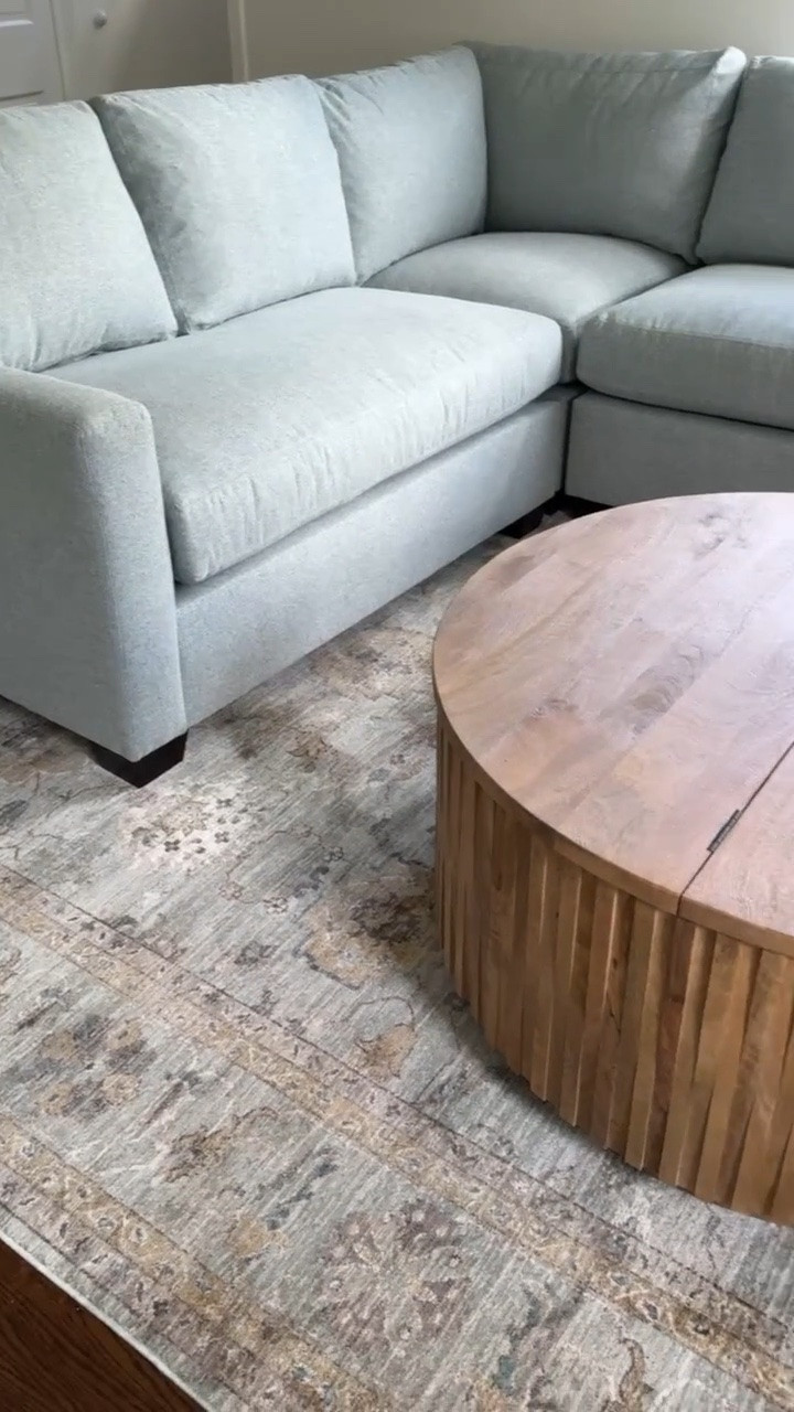 The coffee table that does more than look good. The warm wood and fluted detail are so pretty, but the hidden storage is what really makes it work in a family room.

storage coffee table, round coffee table, wood coffee table, hidden storage, living room furniture, family room decor, fluted coffee table, home organization, living room ideas, girlonthehudson

#LTKHome #LTKKids #LTKdayinmylife