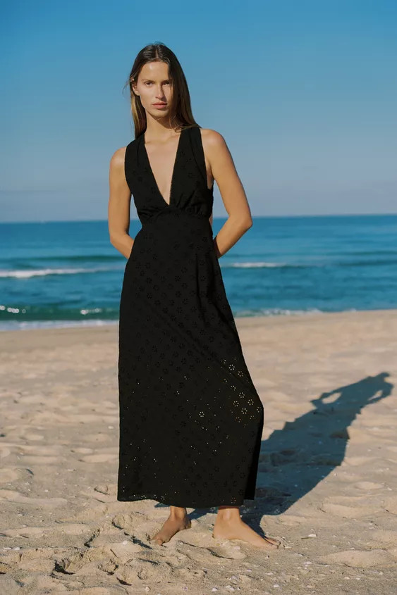 Long dress with a V-neck and wide straps that cross at the back with a buckle fastening. Features... | Zara UK