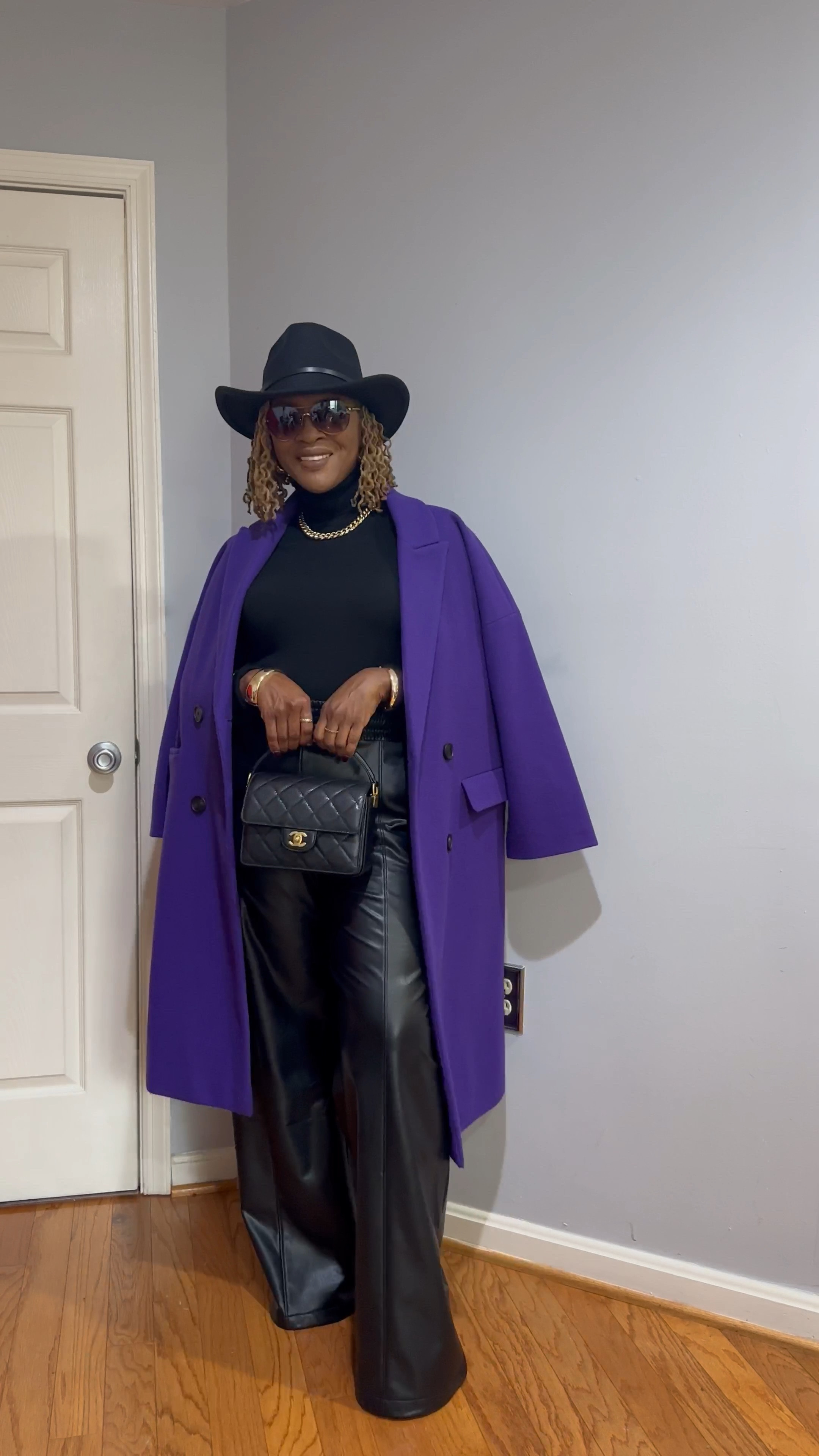 Black outfit with a pop of purple 

#LTKHoliday #LTKStyleTip #LTKOver40