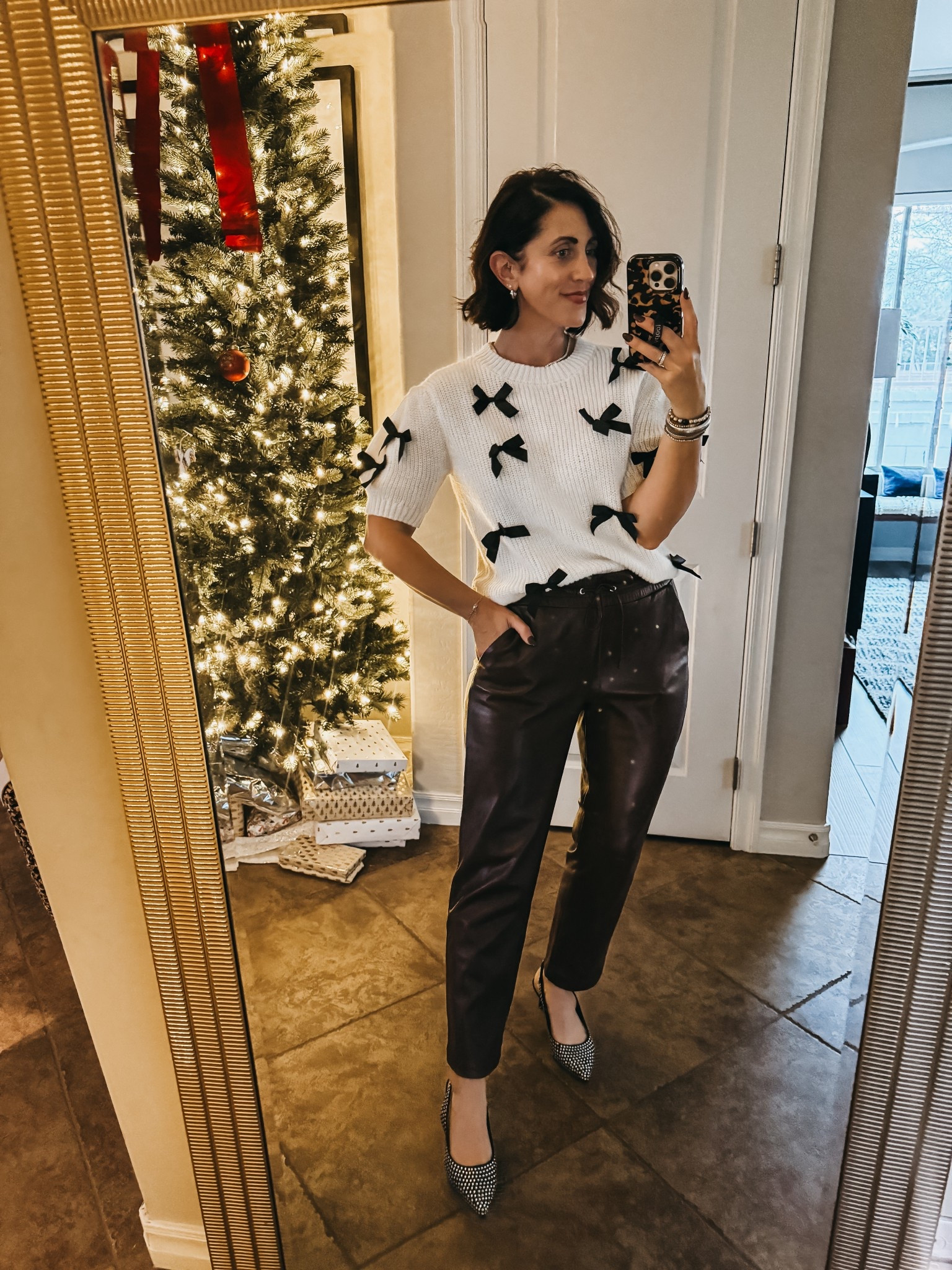 Last night‘s holiday outfit! ❤️🎄💫

*Bow sweater is still in stock! — wearing size small 

*faux leather pants in burgundy - size small l(inked similar)!

#LTKSaleAlert #LTKOver40 #LTKHoliday