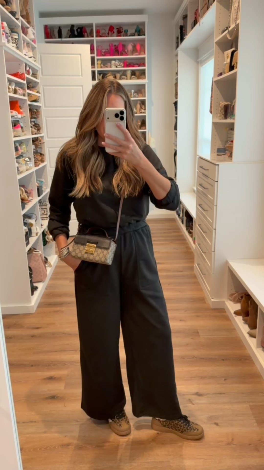 In a medium wide leg jumpsuit, sneakers and accessories - fits tts.

#LTKFindsUnder50 #LTKStyleTip #LTKSeasonal