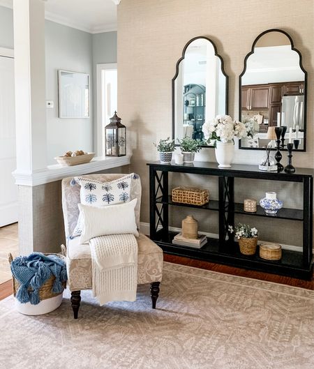 Spring refresh console table styling. black scallop mirrors on sale, neutral area rug on sale and in stock at Wayfair, black console table, Side chair, white hydrangeas, blue and white vase, rattan candle, pretty Blue and white pillow, basket. Target, Kirkland’s Home, Wayfair, Ballard Designs, Walmart. Home decor accessories, interior styling, design. Free shipping .


#LTKhome #LTKunder50 #LTKsalealert