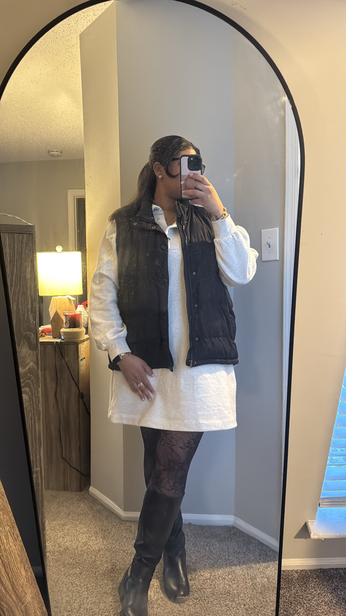 Cozy and chic for winter days ✨ Styling this cream sweater dress with rose-detailed tights, a classic black puffer vest, and sleek black boots for the perfect balance of warmth and elegance. Jewelry details coming up next—stay tuned for a closer look at my favorite pieces that complete this outfit! Shop the look on my LTK 💫 #WinterOOTD #CozyChic #LTKStyle

#LTKWorkwear #LTKStyleTip #LTKSeasonal