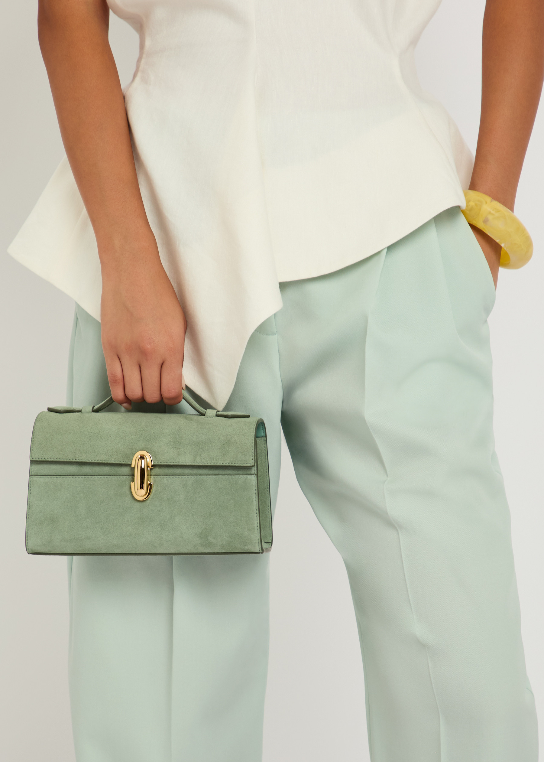 Symmetry suede pochette | Harvey Nichols