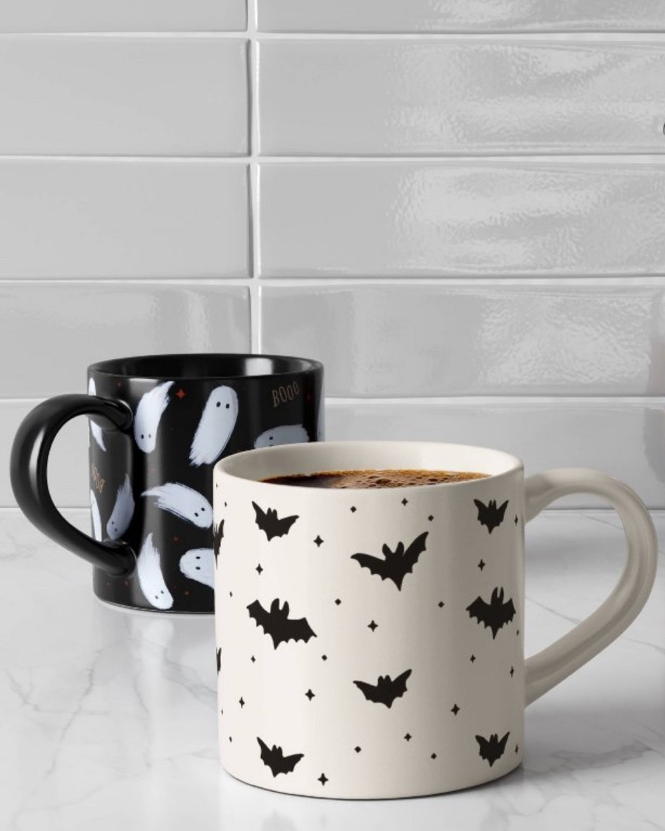 The Halloween Stoneware Mini Bat Pattern or Spooky Soaring Ghost Mugs are a seasonal addition that bring a festive touch to your kitchen. With a 16-ounce capacity, these stoneware mugs are decorated with an allover mini black bats or mini ghosts pattern giving them a spooky, Halloween-themed design. They are perfect for both hot and cold beverages, and dishwasher-safe to ensure easy and hassle-free cleaning.

#LTKSeasonal #LTKHome