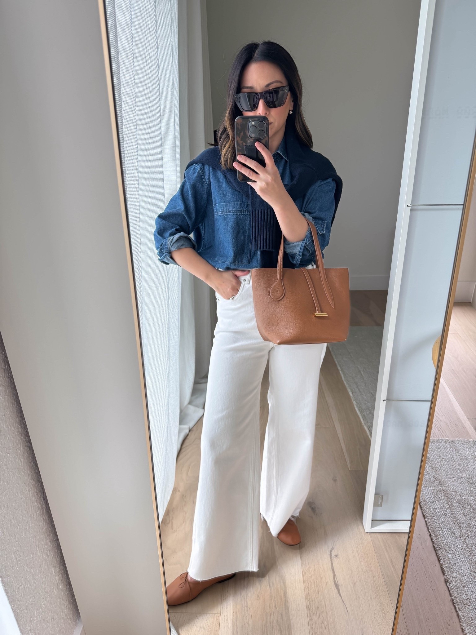 The most flattering white jean! Everlane’s way high 2.0 sailor jeans. High rise wide leg. I did have to cut the hems on these.

Gap Big Shirt petite xs
Everlane sailor jeans 25, but hems
Everlane cotton sweater xs
Everlane ballet flats 5
Marea tote - sold out, linked similar 
Celine sunglasses 
Electric picks earrings
Dorsey James necklace 15”

Spring outfits 2026, white jeans, petite style

#LTKootd #LTKSaleAlert #LTKPetite