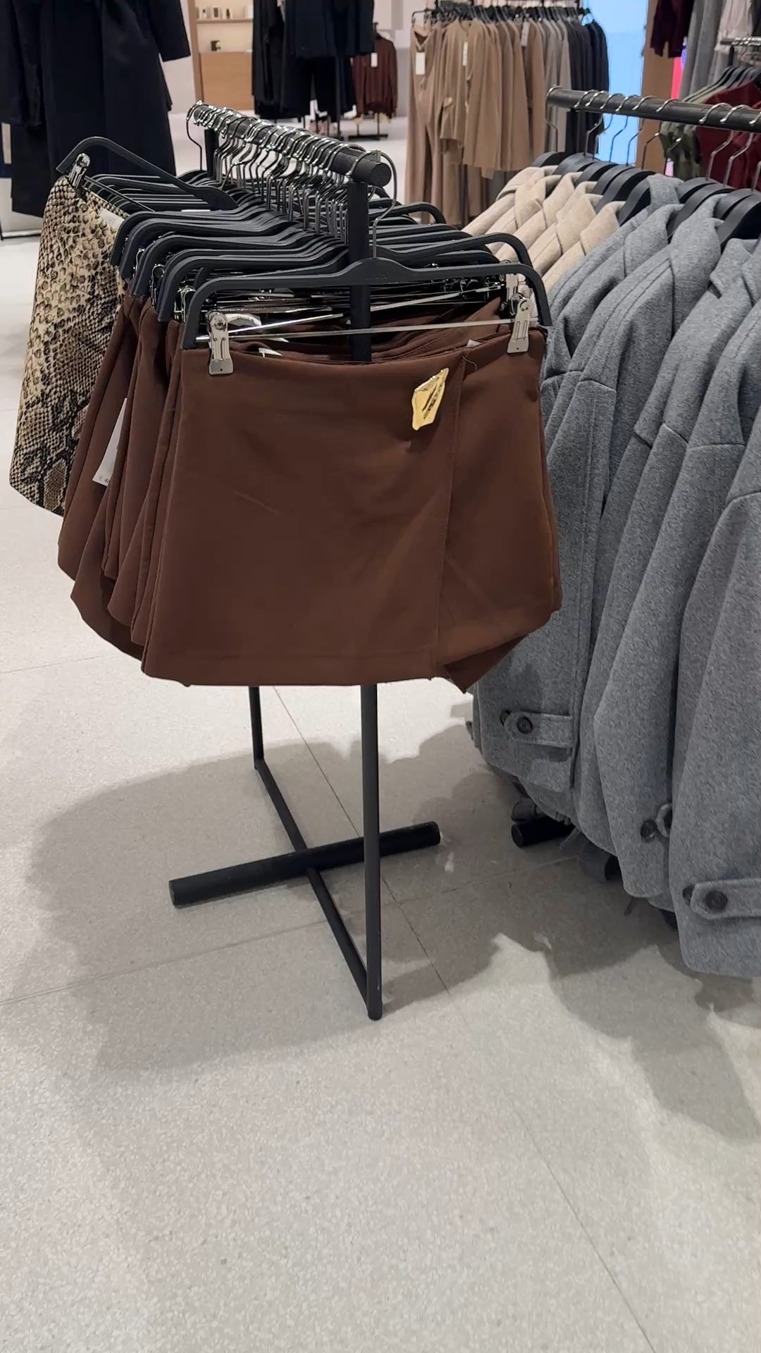 Brown skirt with gold metal detail closure! Comes in multiple colors! 

#LTKStyleTip #LTKFindsUnder100 #LTKFindsUnder50