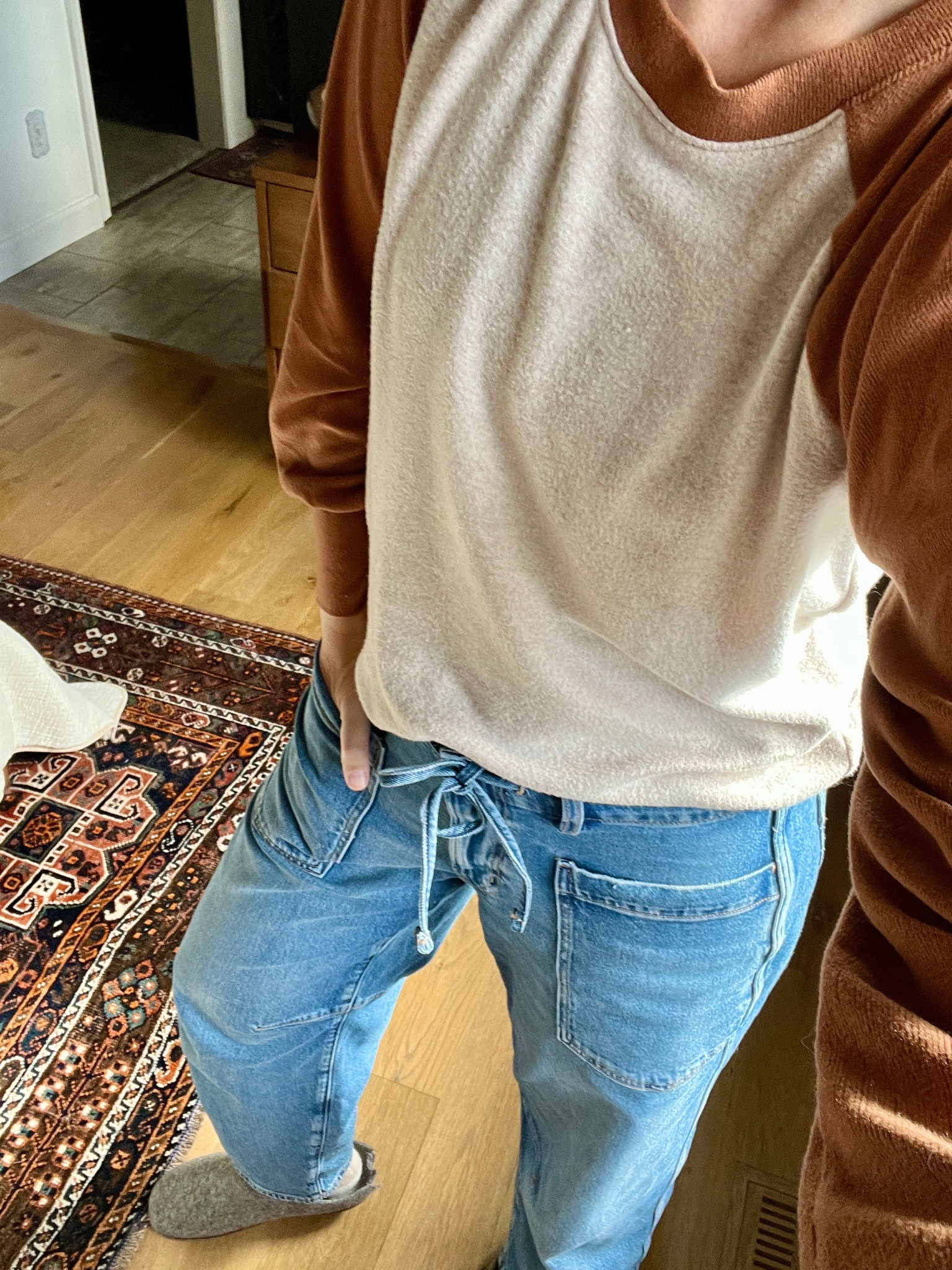 Baggy fit slight barrel jean (ankle length). I’m obsessed with them and feel like they go so well with a low tennis shoe. I’m 5’8” and ordered my smaller size and got them in a long. They do stretch with wear but I’m not sure I would have liked the barrel jeans in a smaller size. Shirt is super cozy (so soft) with a cute detail on the shoulders. 

#LTKStyleTip #LTKFindsUnder100 #LTKFindsUnder50