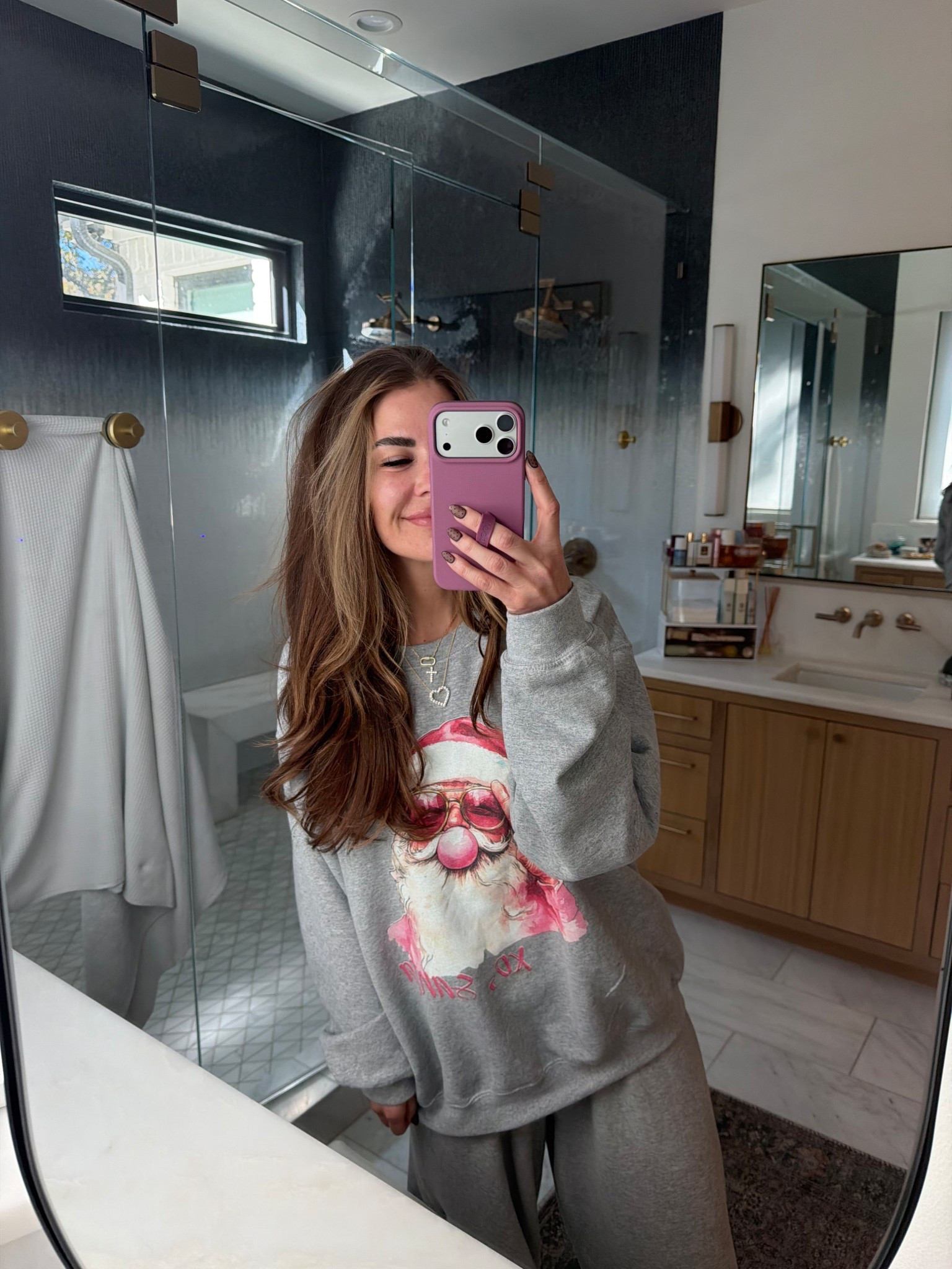 santa sweatshirt restocked! wearing a size large! use code AMBER for 30% off 

#LTKGiftGuide #LTKHoliday #LTKSaleAlert