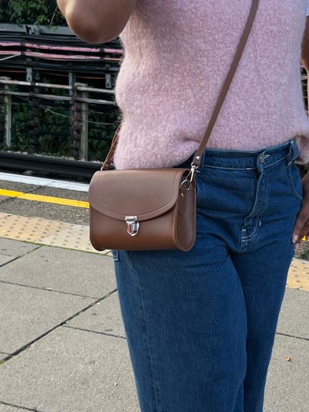 Have had this leather pushblock bag for years and never really used it 🤦🏾‍♀️ infact, this one was from my mum and I also have the larger version in pink. Cross body bags seem to be the way to go atm so I whipped this one out; it’s a classic right?! 

#LTKeurope #LTKitbag #LTKfindsunder100