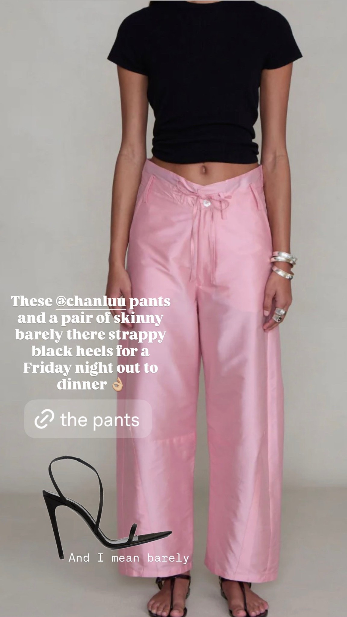 Pink pants with the skinniest strap black heels for dinner