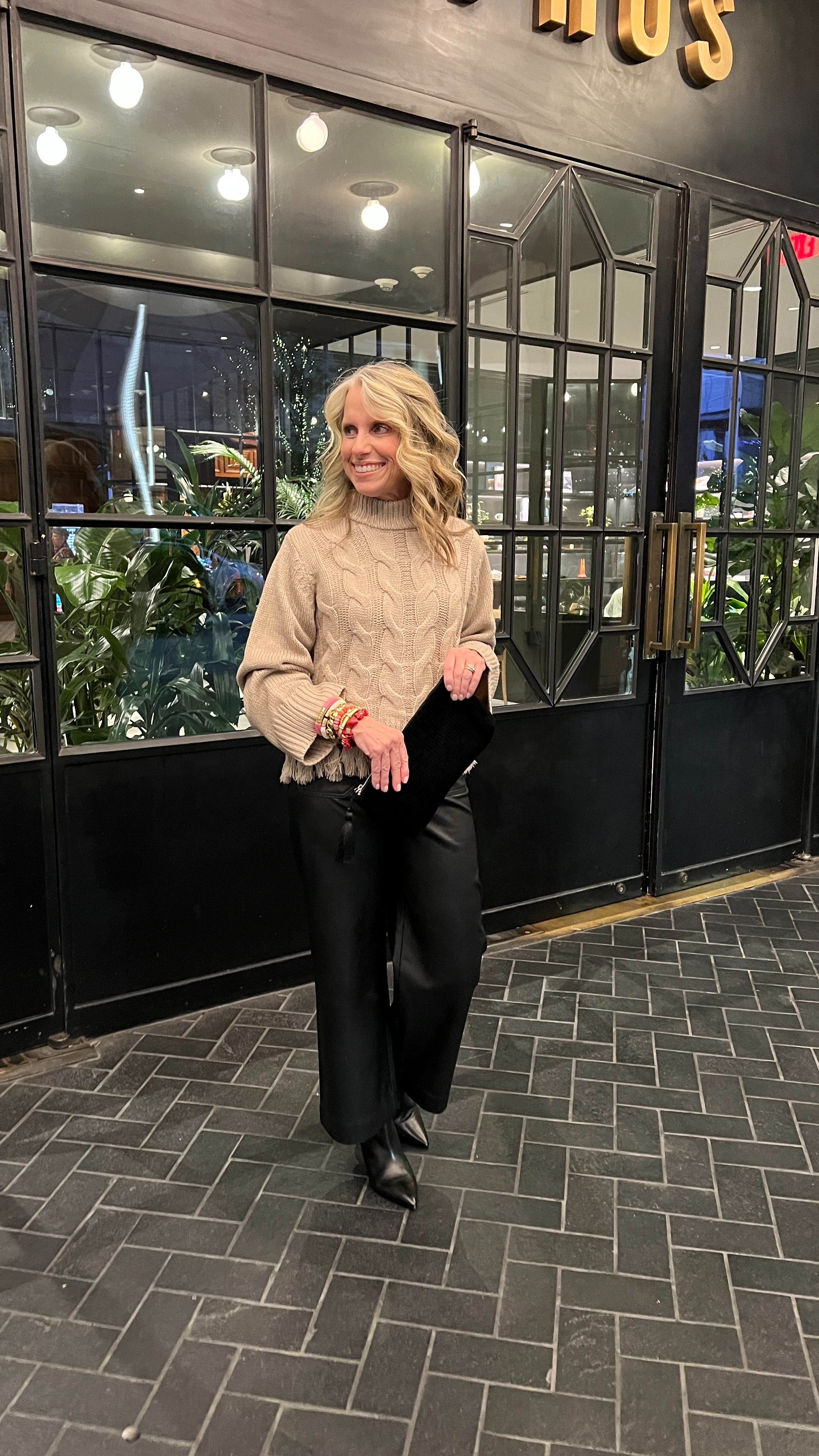 Dinner out with the girls in Dallas. 
Wearing Collette cropped faux leather pants. Wear them dressed up or with sneakers and a sweatshirt. 
Sweater has bell sleeve and fringe bottom for a super fun look. wearing XS 

Use COAST20 on my Allie + Bess bracelets 

 

#LTKOver40 #LTKStyleTip #LTKHoliday