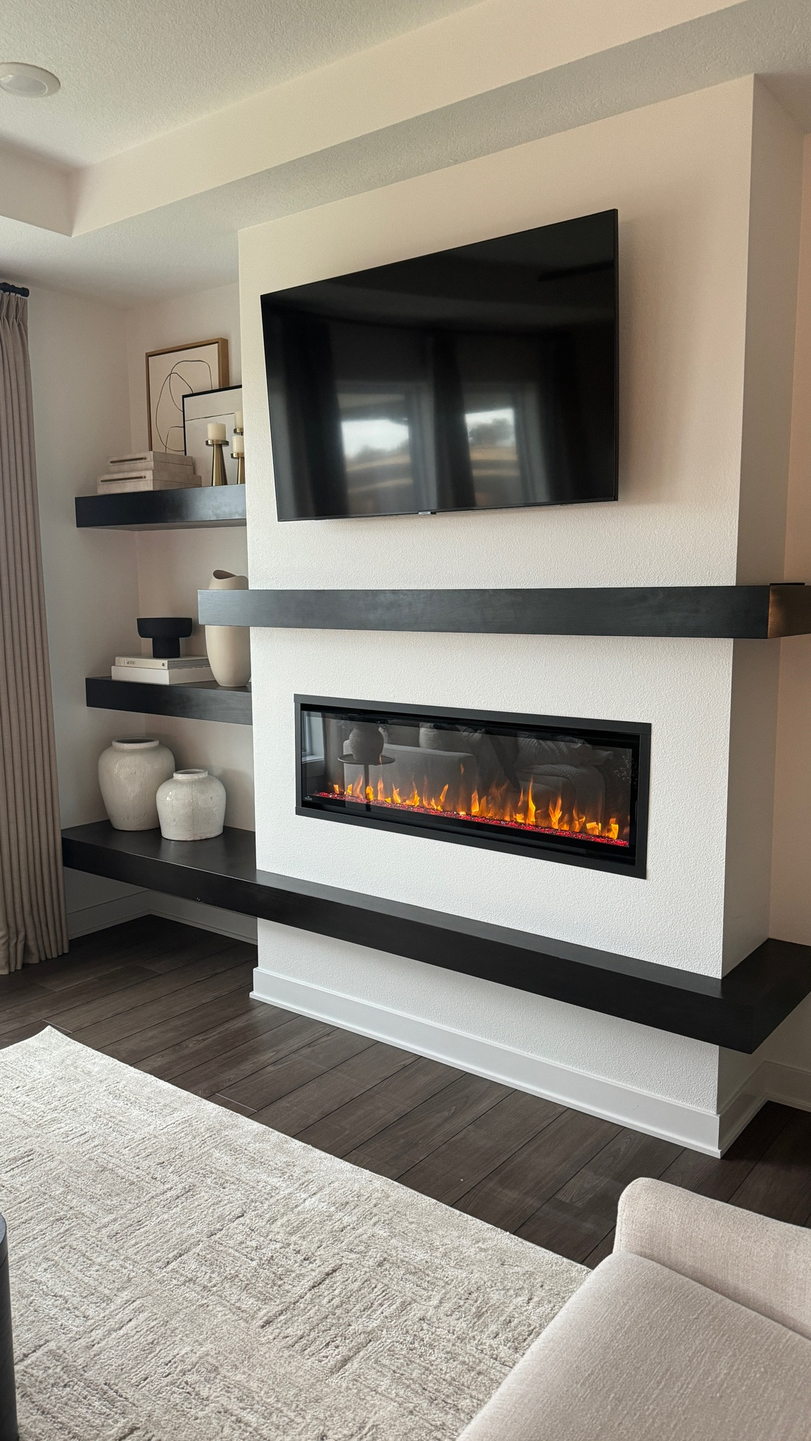 Modern living room mantle decor. Floating shelf decor. Fireplace insert.

#LTKSaleAlert #LTKHome #LTKStyleTip