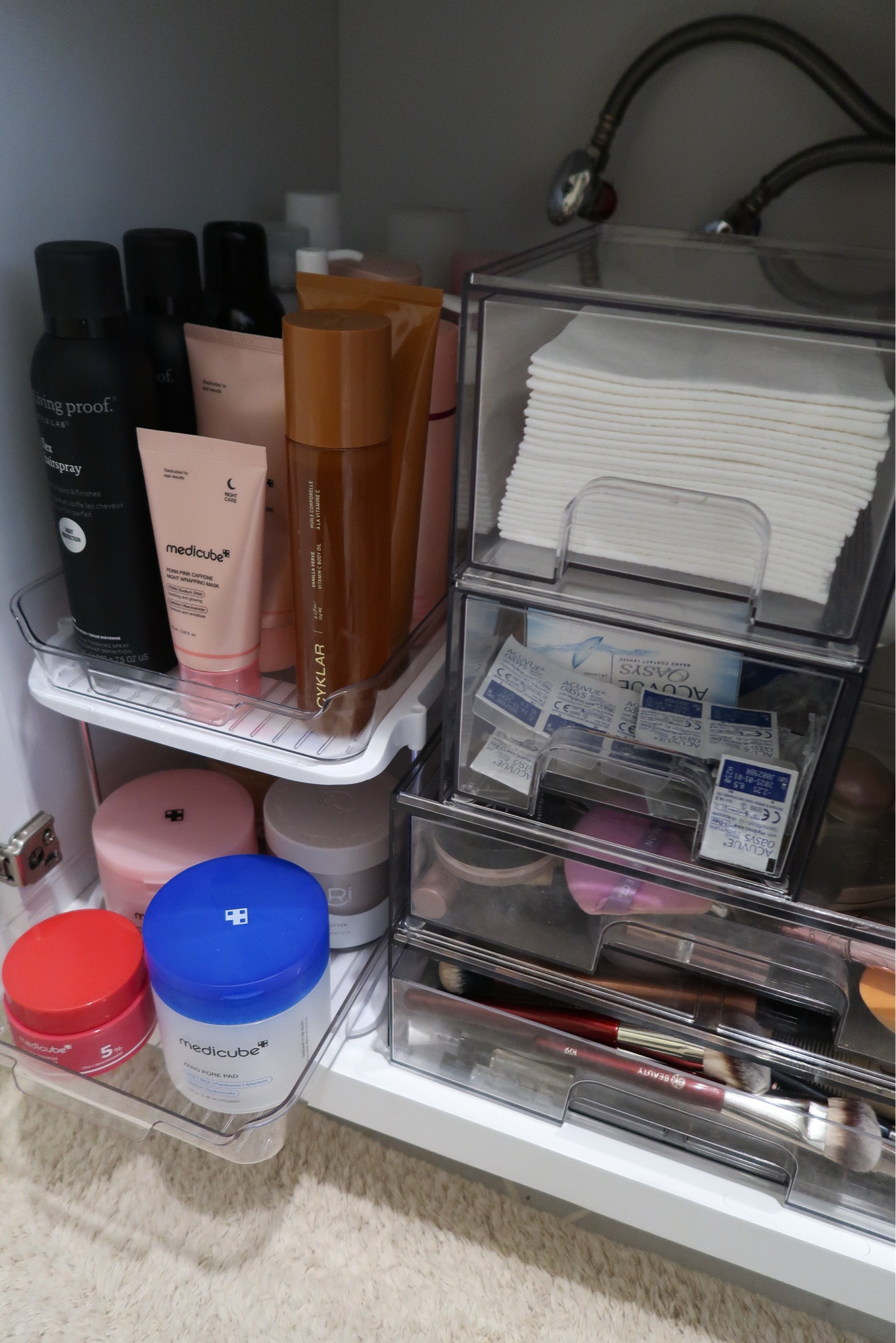 There is nothing more satisfying than a Sunday home reset, starting with this organized bathroom cabinets. I used these clear acrylic bins and tiered organizers to maximize every inch of space around the plumbing. No more digging for products or losing bottles in the back—everything has a dedicated "zone" and is easy to grab. These Amazon home organization finds are durable, aesthetic, and truly a game-changer for maintaining organization in my home. ☁️🏠 

 #LTKHome #LTKFindsUnder50 #LTKBeauty