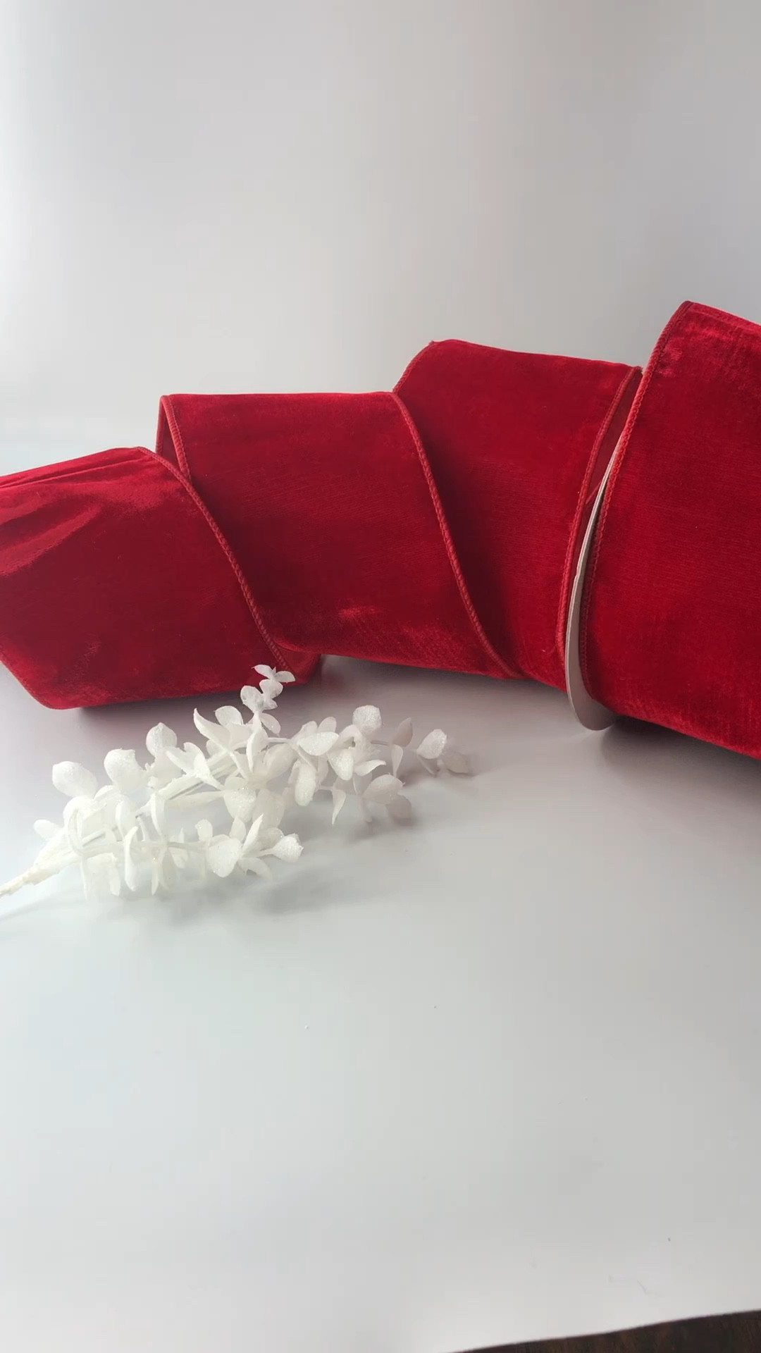 Red velvet ribbon is a Christmas classic that’s never going out of style.  This designer ribbon is double sided, four inch, wired velvet ribbon from Farrisilk.  This ribbon is perfect for bows, trees, wreaths, mantels, any Christmas decor.

#LTKhome #LTKSeasonal #LTKHoliday