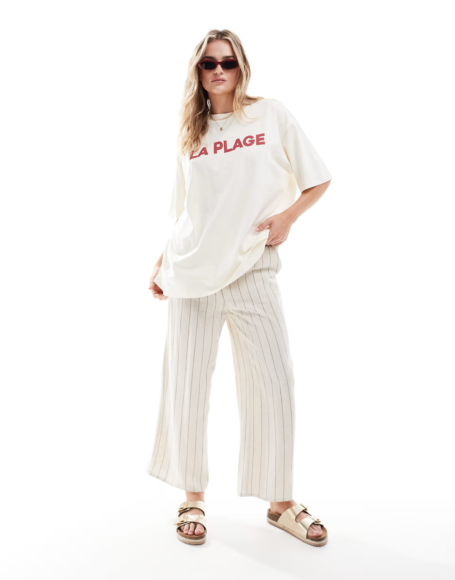 ASOS DESIGN boyfriend fit t-shirt with la plage graphic in cream | ASOS (Global)