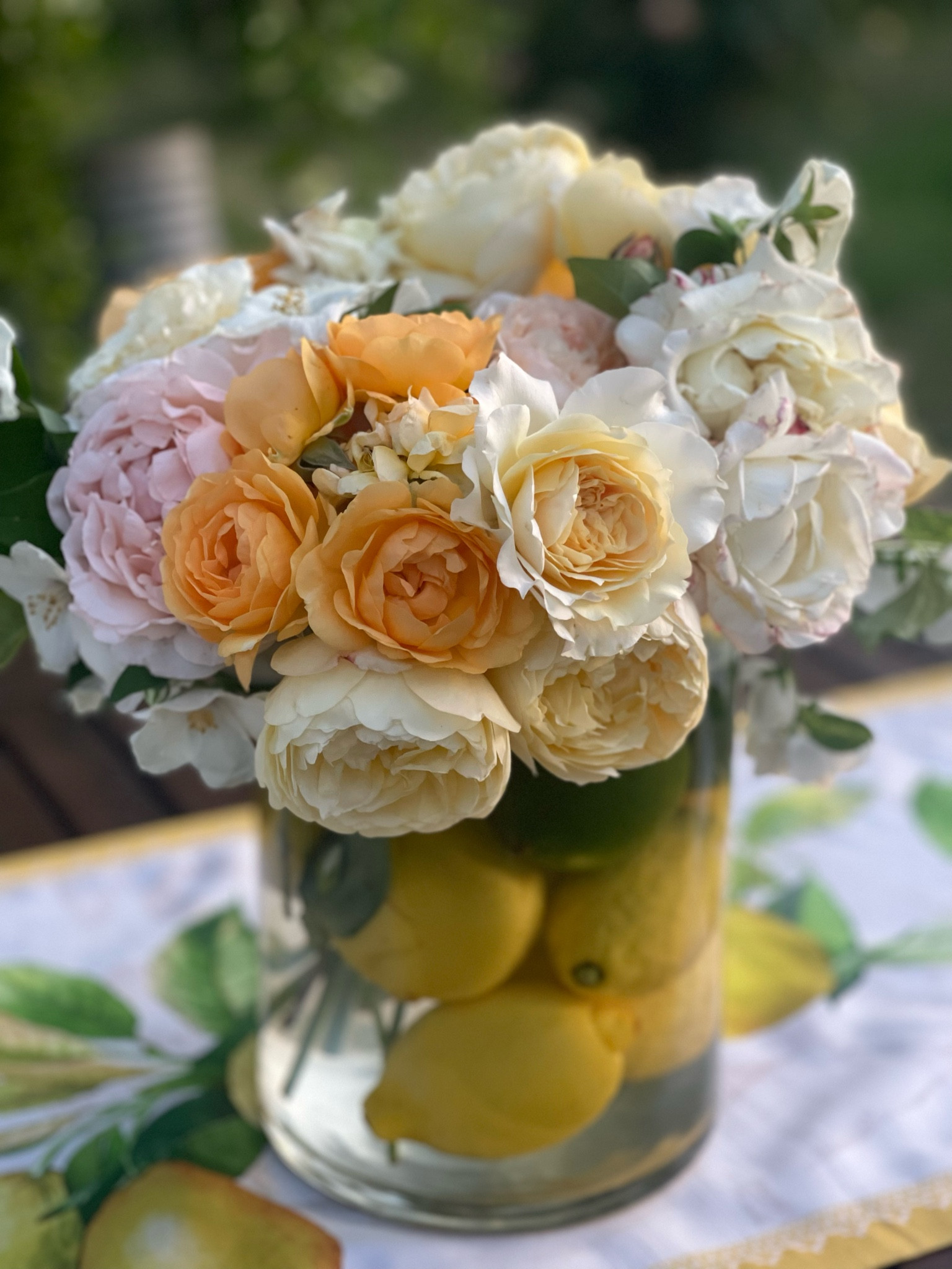Summer tablescape. Beautiful yellow and white flowers in a vase! Best vase under $10. Walmart vase. Walmart home. Best glass vase. Lemon table runner. Italian summer aesthetic. Italian summer home. Outdoor tablescape. Elegant outdoor tablescape on a budget. Amazon home. Amazon finds. 💛🤍🍋 

#LTKhome #LTKunder50 #LTKFind