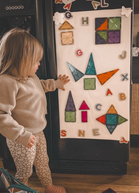 Time to get creative! This simple DIY activity is perfect for your toddler. 

I get to make dinner and she gets to have fun! Who knew craft paper and magnets could be so exciting!

All you have to do is trace the magnet shapes onto the paper and I wrote letters in the blank spaces for her to match. 

Learning can be fun too!

#LTKfamily #LTKkids #LTKfindsunder50