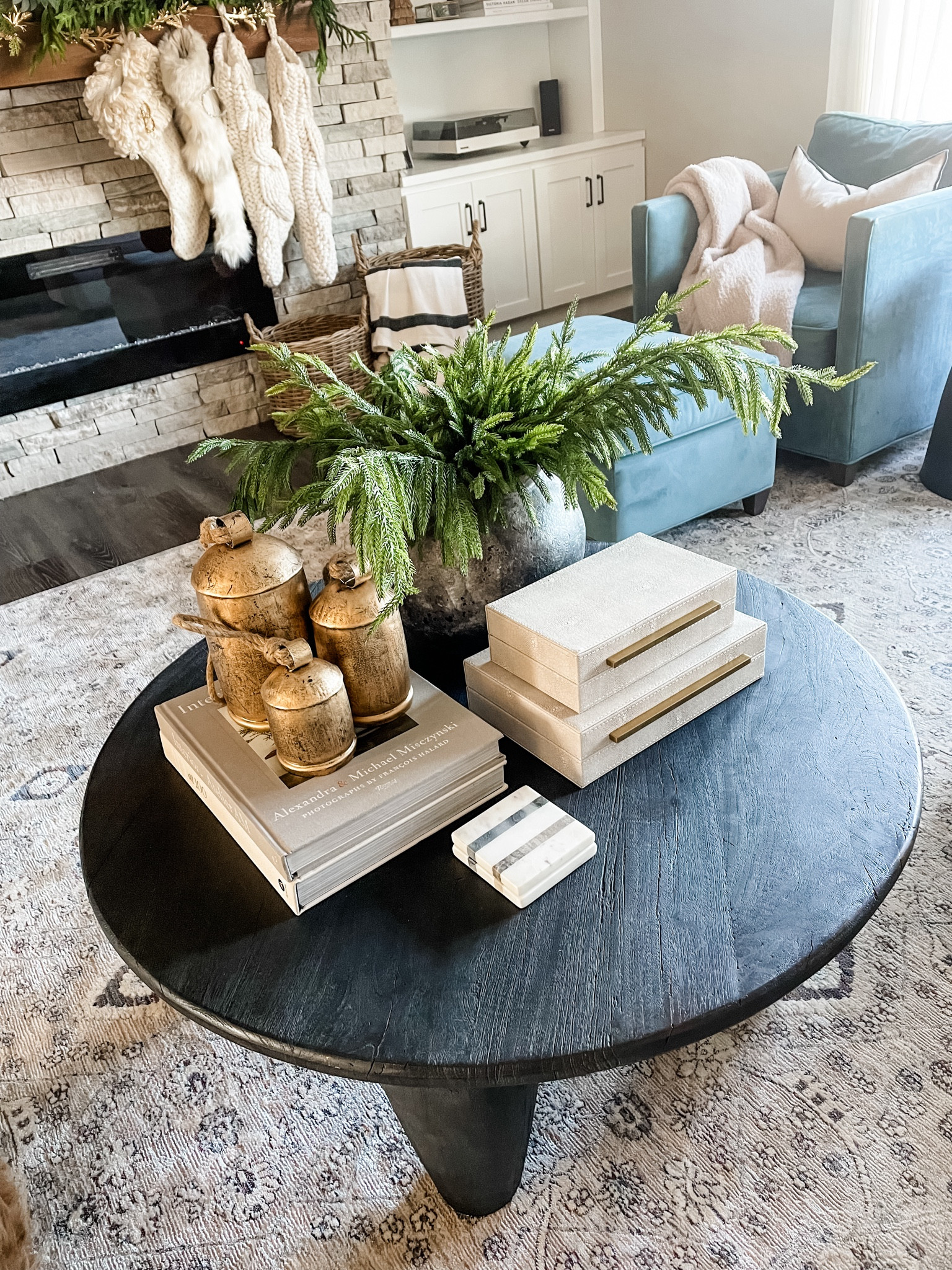 Christmas decor, coffee table, faux stems, Norfolk pine, real touch stems, greenery, holiday, wood table, McGee & Co, vase, coffee table book, decorative accents, storage box, boxes, coasters, cow bells, amazon finds

#LTKHoliday #LTKhome #LTKSeasonal