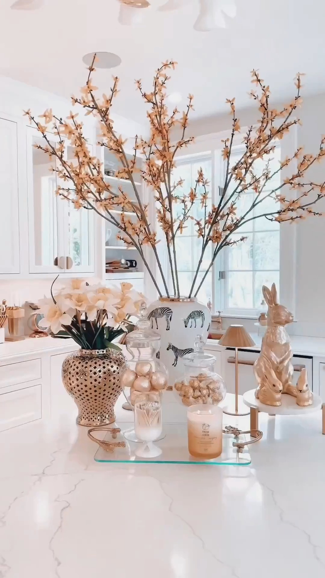 Spring has officially arrived in my kitchen! Forsythia and daffodils are nature’s way of saying, “Darlings, it’s time to glam up for the season!” Since they’re the first to bloom, I took inspiration from them to create this early spring vignette—golden hues, elegant details, and a touch of whimsy. (Because even bunnies deserve a little luxury.) ✨
There’s something so fresh and uplifting about these early spring colors—like a warm welcome after a long winter’s nap. Now, all that’s missing is a champagne toast to the new season!
Comment YELLOW to get the links!
Stay fabulous and chic!

#LTKHome #LTKSeasonal