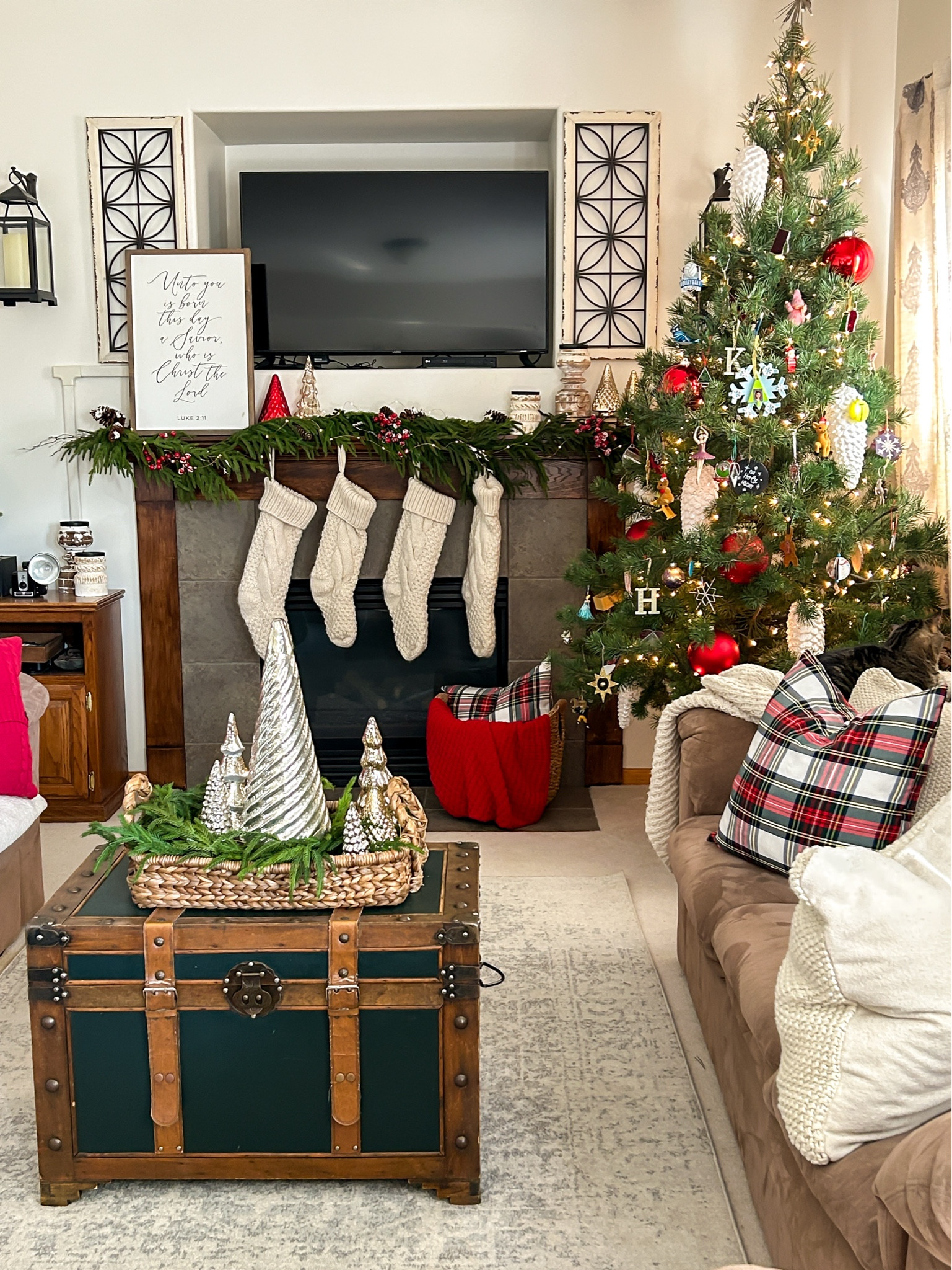 Cozy Christmas decor in the living room with pops of red and plaid ❤️✨

#LTKHoliday #LTKSeasonal #LTKHome