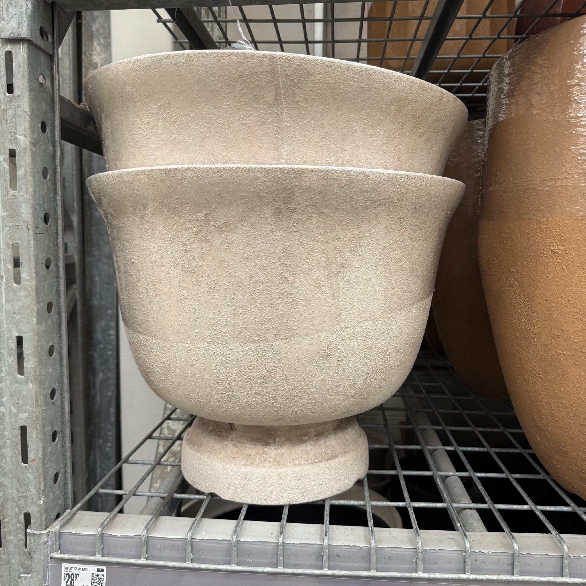 I had to talk myself out of buying these beautiful lightweight urn planters.  You can’t tell by the photo, but they are quite large.  They would look amazing on your porch or patio.  The price is great too. ￼

#LTKHome #LTKSeasonal