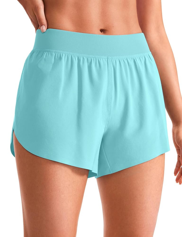 CRZ YOGA Mid Waisted Dolphin Athletic Shorts for Women 4" Lightweight High Split for Gym Workout ... | Amazon (US)
