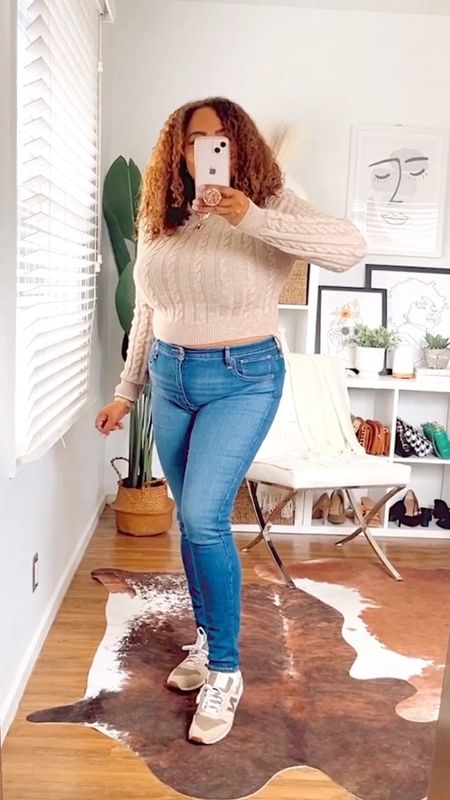 A little cropped cable knit sweater, jeans & sneakers 👟for the weekend 😎. I got this sweater in an xl and jeans in a 32! I am so into these Levis by the way - got 4 pairs in this style 😮🫣. 

#LTKcurves #LTKunder100 #LTKFind