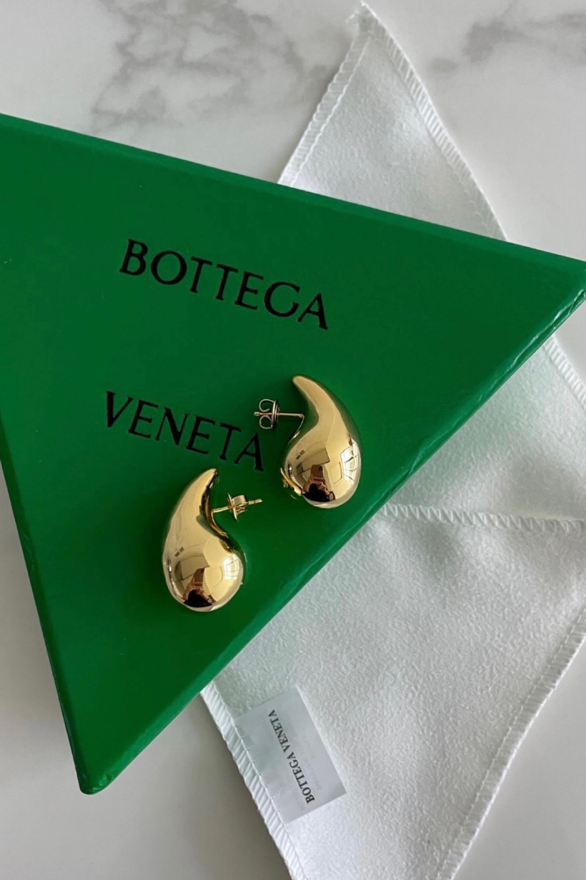 Bottega drop earrings $27 normally retailing for $1,350. #earrings #gold #dupes 

#LTKbeauty #LTKsalealert #LTKover40