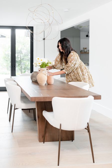 Modern and bright dining

Farmhouse inspired dining table, sculpted upholstered dining chairs, modern pendant, and vessels.

Dining room styling, modern farmhouse dining room, home decor, wood dining table, home finds, interior design. 

#LTKFind #LTKstyletip #LTKhome