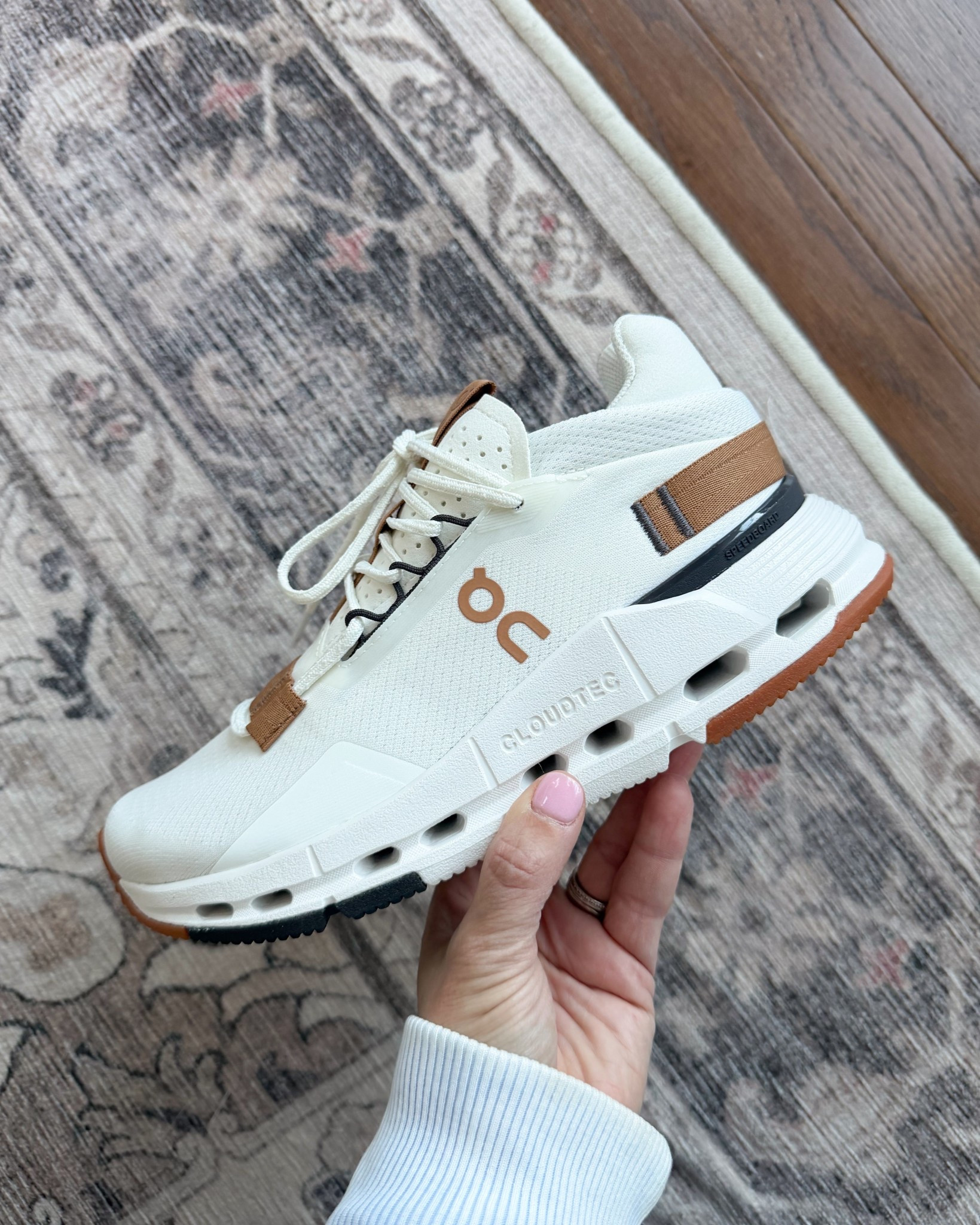 The Cloudnova sneakers are back in this popular color way! They’ve been updated a little bit but still the classic tan, black and white combo that was popular in previous years. 

The sneakers are true to size and are truly one of the most comfortable pair of sneakers I own. I can walk for miles in them without pain. 

#LTKPetite