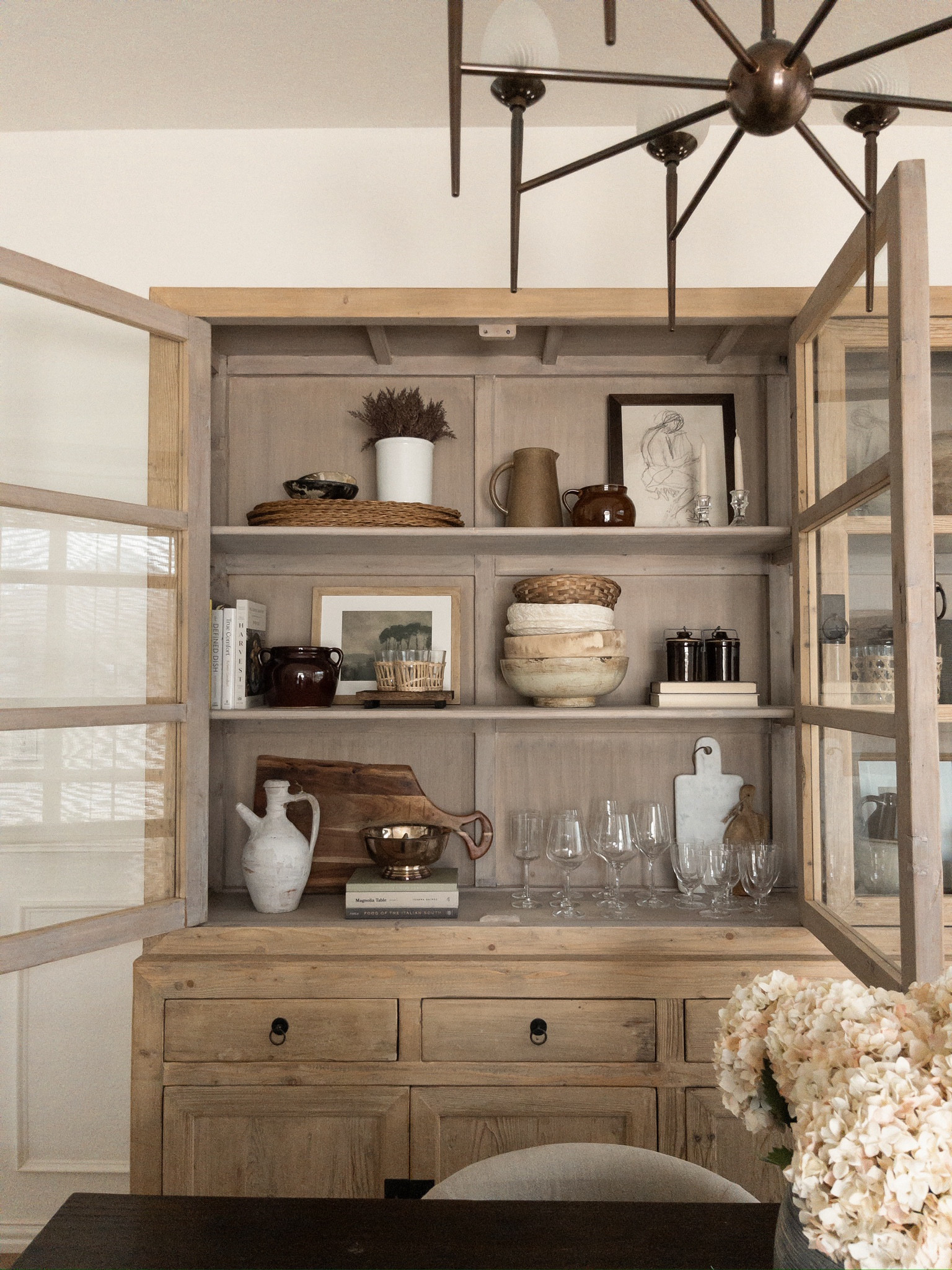 Dining cabinet view // linked a lot of similar items or food shelf styling pieces! A lot of my items are thrifted!

cabinet, cabinet styling, dying cabinet, shelf styling, decor, home decor, dining room inspo, dining room inspiration, framed art, canister, vase, cups, candlestick holder, etsy finds

#LTKhome #LTKstyletip