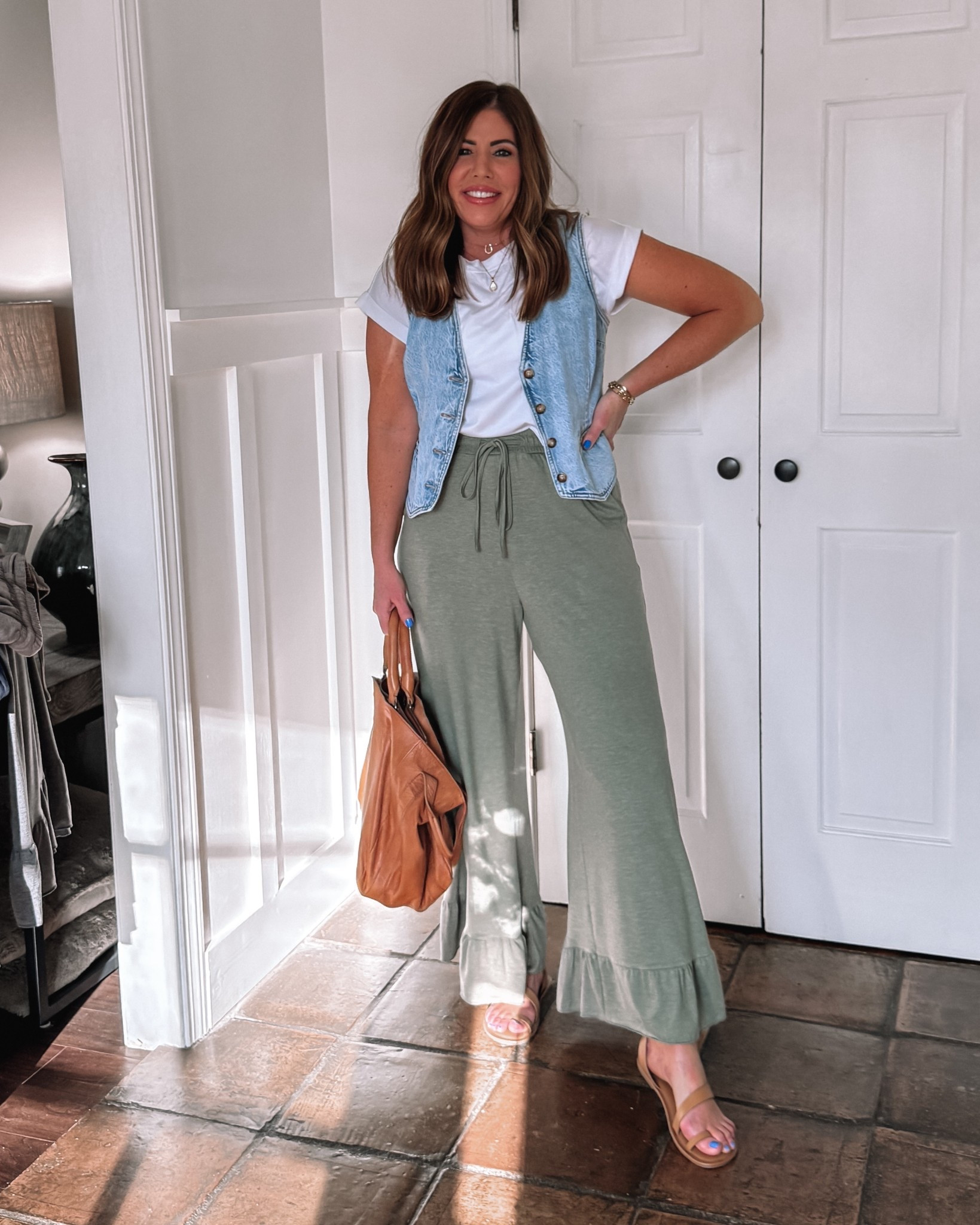 Super cute spring outfit!

Tee and pants are from Amazon!
Tee - medium on sale for $14.99 I love the cropped fit. They go with everything such a good basic and they come in several colors.

Pants- medium on sale for $25
Bag is gorgeous distressed leather and under $250
Vest is old- linking similar option
Sandals- tts and only $25


#LTKSaleAlert #LTKOver40 #LTKStyleTip