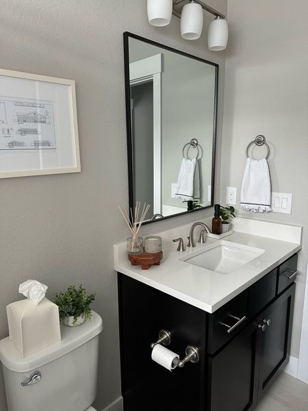 Simple and neutral bathroom decor  

#LTKfindsunder50 #LTKhome #LTKstyletip