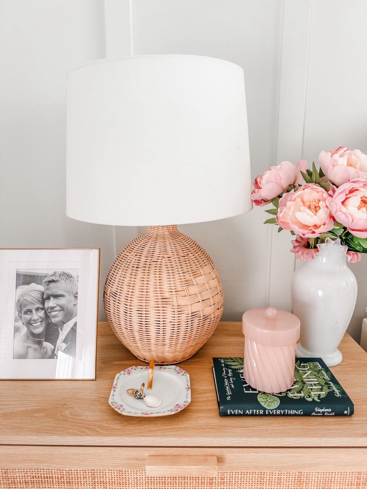 Nighstand decor
Spring floral
Faux spring stem
Pink decor
Peony jar candle
Rattan table lamp
Oversized nighstand
Three drawer dresser
Bedroom decor
Nightstand styling 

#LTKHome #LTKOver40 #LTKSeasonal
