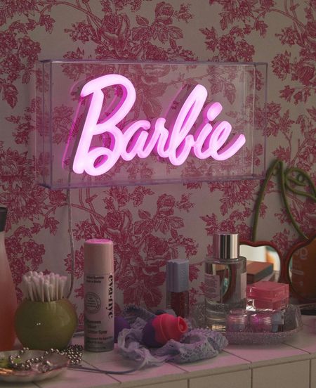 After watching the Barbie movie how could I not buy this!!! Turn your space into Barbie’s dream house with this neon sign. Features the iconic Barbie logo with vibrant white to neon hot pink lighting. Freestanding LED light is backed with durable plastic for easy display. #barbie



#LTKstyletip #LTKunder100 #LTKhome