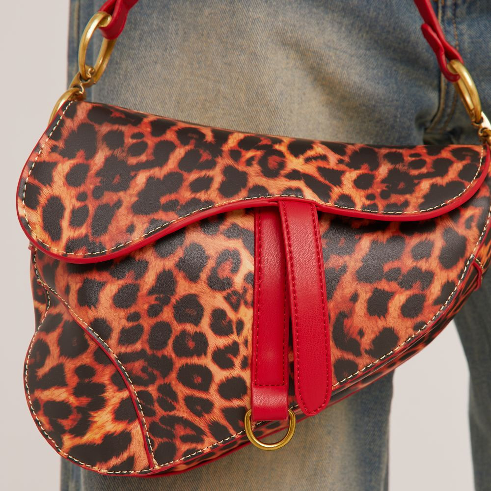 Issy Ring Detail Shaped Cross Body Saddle Bag In Leopard Print Faux Leather | EGO Shoes (US & Canada)