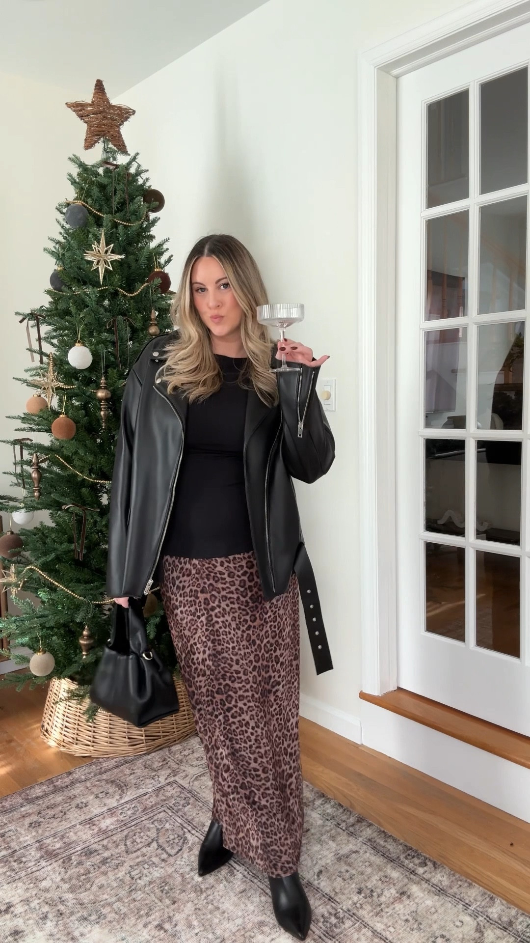 Holiday outfit ideas 〰️ Part 2. Would wear this one for date night or a night out in the city! This leopard maxi is SO comfy and currently under $50. Wearing M in everything! Boots 20% off with my code DANIELLE20  

#LTKHoliday #LTKSeasonal #LTKWatchNow