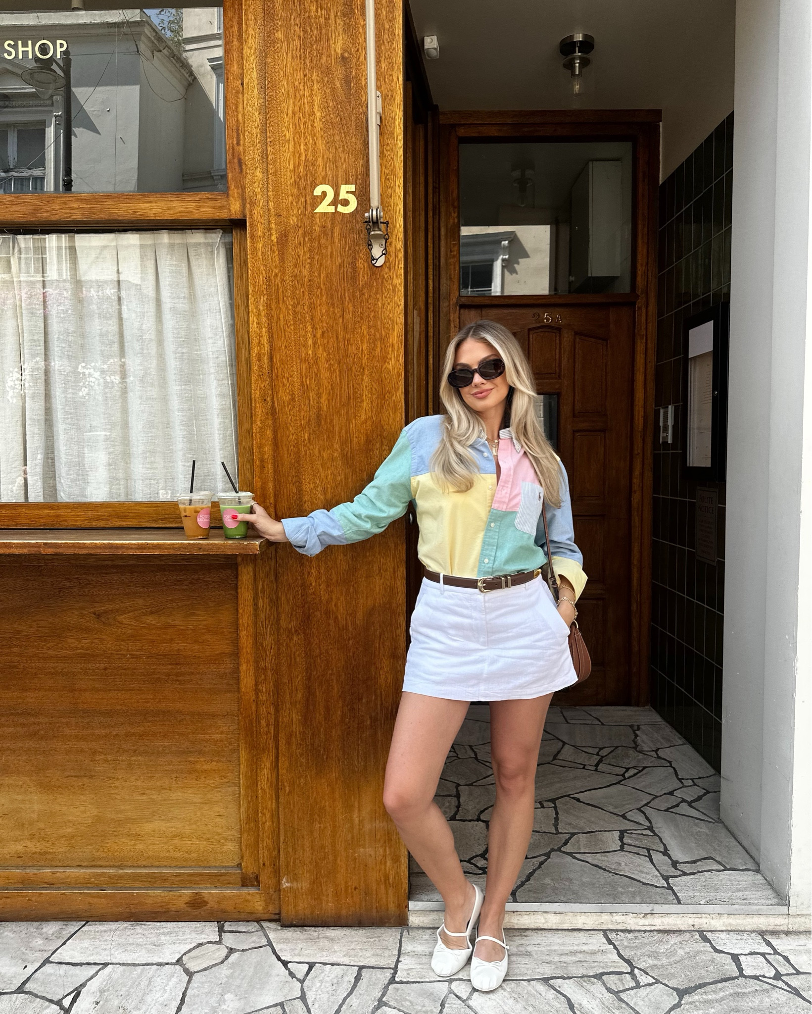 Summer uniform unlocked: A pastel Ralph Lauren button-down, crisp white mini skirt, and ballet flats for the ultimate coffee run look. 🍓☕ This outfit is cute, casual, and perfect for strolling through Notting Hill, grabbing iced matchas, or catching up with friends. Styled with a neutral crossbody and classic belt to pull it all together.

#LTKStyleTip #LTKShoeCrush