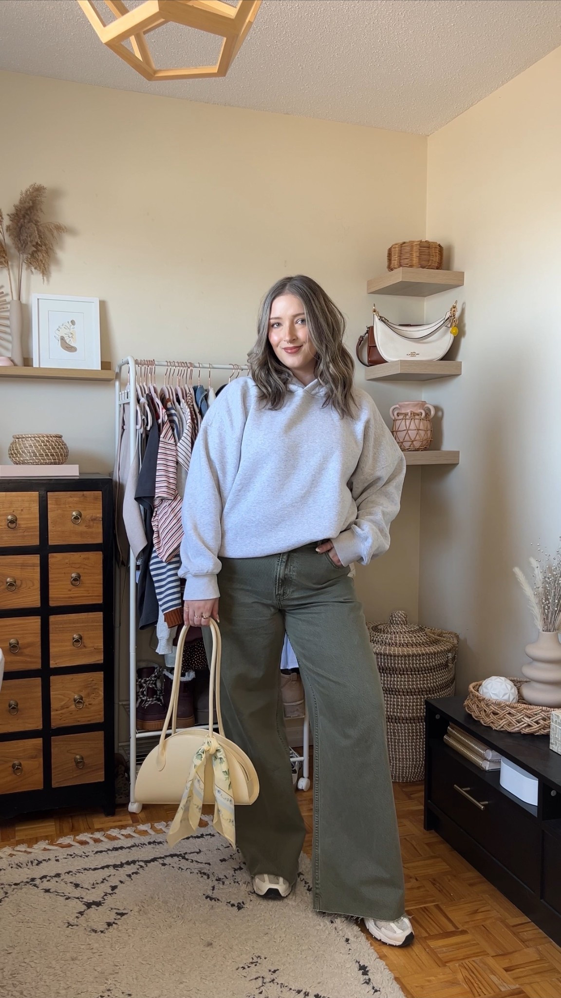 Abercrombie spring outfit! Wearing 32 long in the jeans & I cut the hem for a custom length. Sized up to XL in the grey hoodie for an oversized fit. New Balance sneakers run a little big, I’m a 9.5-10 and wear a 9. Butter yellow shoulder bag and scarf are from Old Navy, Canadian links are under similar products

#LTKmidsize #LTKjeans #LTKstyletip