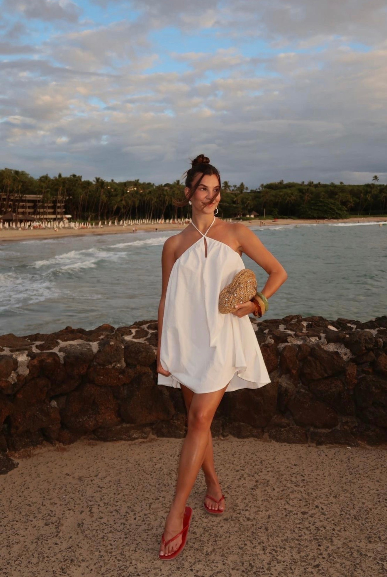 Dinner outfit in Hawaii🌺 wearing a size small in the dress but could’ve done xs — I’m 5’4 for reference!

Hawaii dress, Hawaii outfits, Hawaii outfit inspo, meshki dress, casual beach vacation look, meshki, amazon accessories, amazon beach bag, amazon beach clutch, amazon flip flops, red flip flops, white beach dress, white mini dress , amazon jewelry