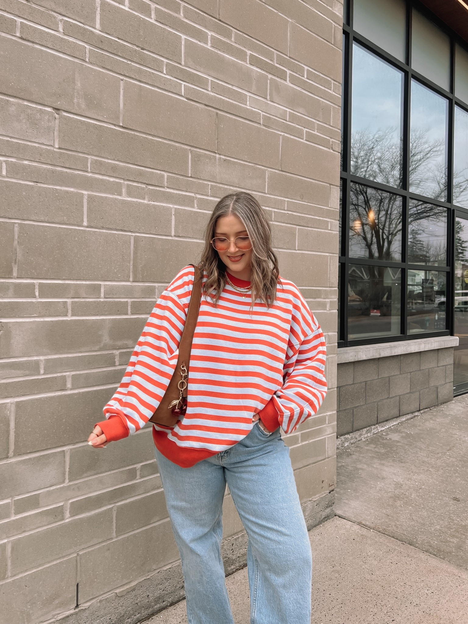 Simple & fun spring outfit! Striped sweatshirt is so cozy and I love the peach & baby blue color combo! Runs big, sized down to M. Wearing my usual 32 in the jeans. I’m a 9.5-10 shoe and wear a 10 in the Ugg tazz platforms


#LTKstyletip #LTKsale #LTKmidsize