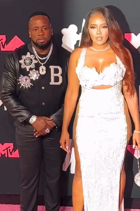 Yo Gotti posed with Angela Simmons at the MTV vMAs in a Balmain jacket 