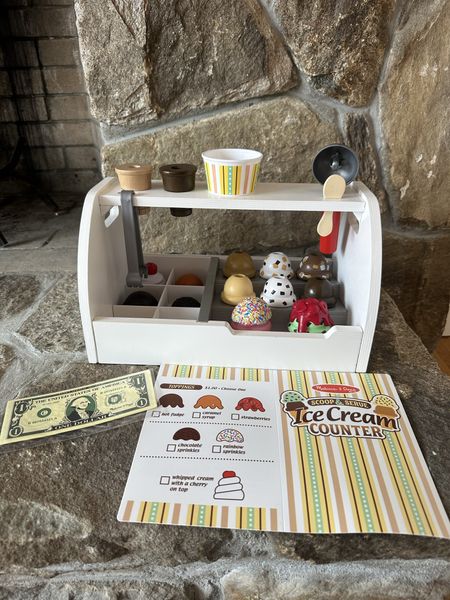 This wooden Ice Cream stand from Melissa and Doug is a huge hit with the littles in my life. It comes with multiple “flavors” a scooper, a menu, cups and cones, and even money! 

#LTKGiftGuide #LTKbaby #LTKkids