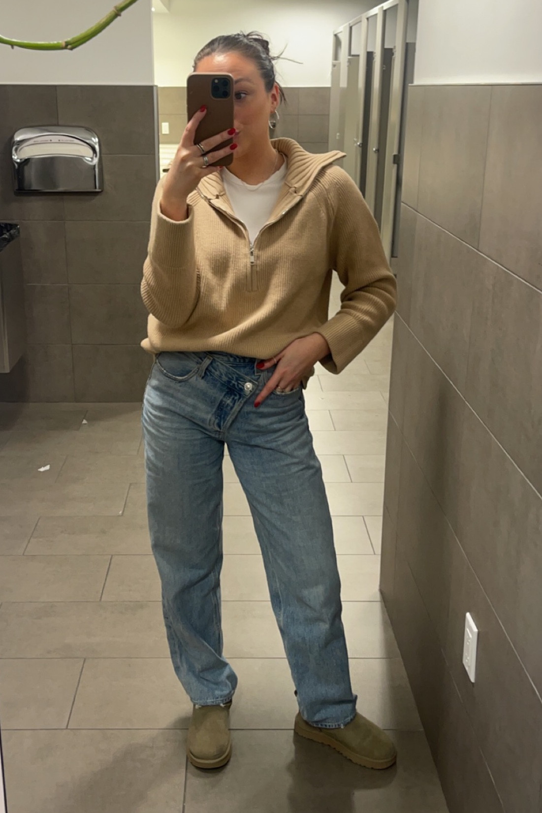 Asymmetrical criss cross jeans / ultra mini Uggs 
Amazon zip polo sweater 