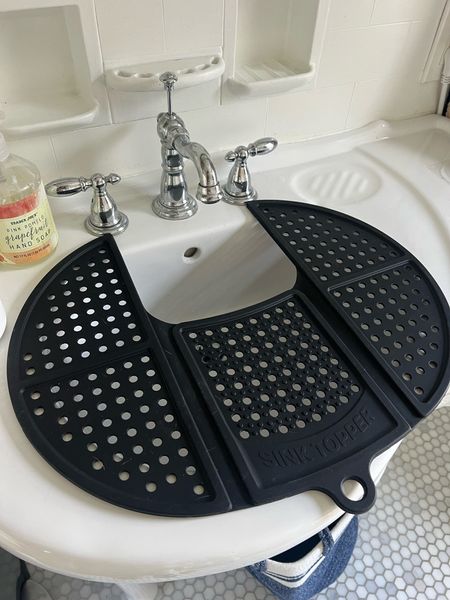 Sink topper mat! Great for hot tools (curling iron, straightener, etc) and makeup. Provides extra space in your bathroom while getting ready. 

#LTKFind #LTKsalealert #LTKhome