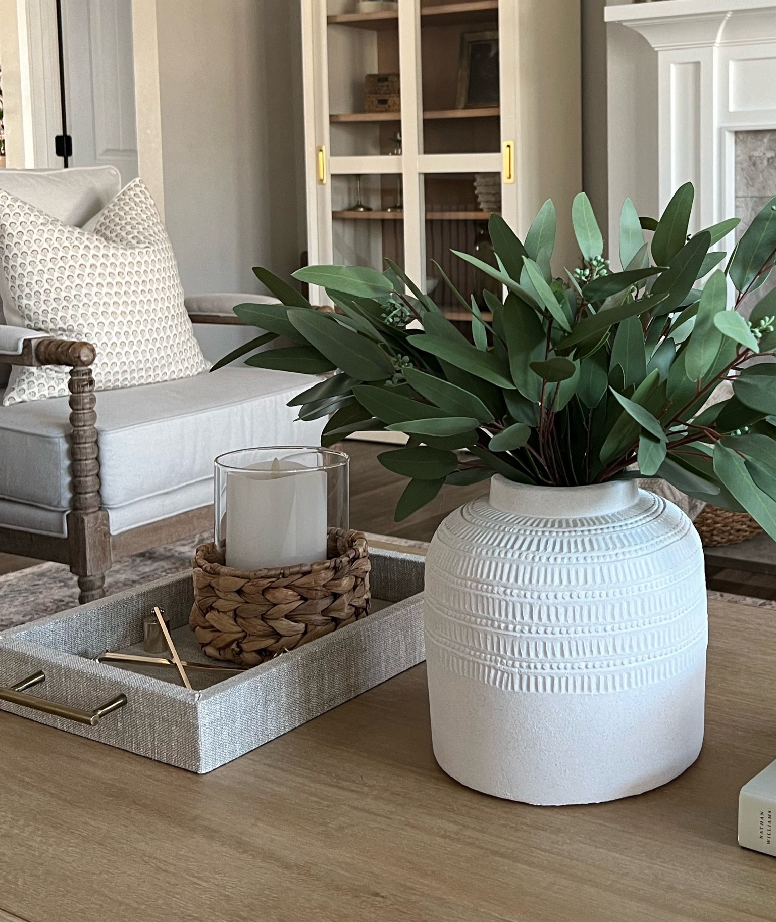 Loving my new coffee table decor. Plus, these are my all time favorite stems. I use them all year long in my home. There’s even a matching garland that I use during the holidays. 

Eucalyptus / stems / white vase / linen tray / candle accessories / candle hurricane / coffee table / pillow covers / wood chairs / faux greenery / stems 

#LTKfindsunder100 #LTKhome #LTKfindsunder50
