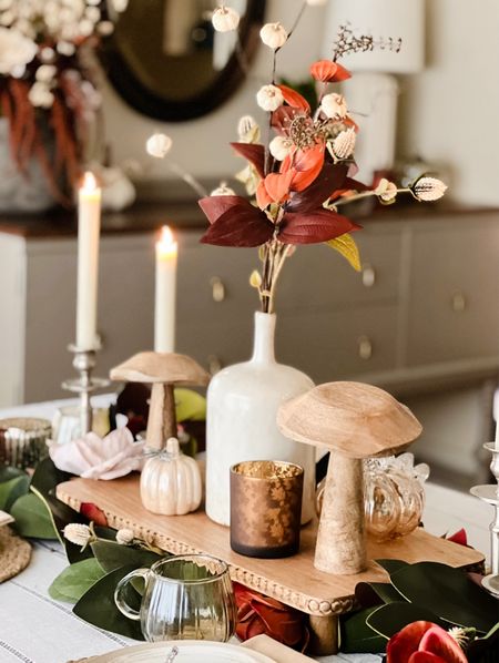 Thanksgiving tablescape with pumpkin glasses and fall votives. Battery-powered candles, magnolia leaves, and mushrooms. 

#LTKHoliday #LTKSeasonal #LTKhome